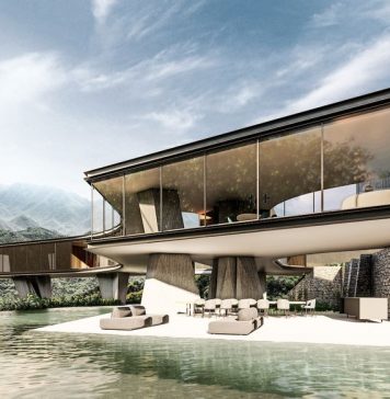 Дом Xingú, стоящий на толстых бетонных столбах Дом Xingú